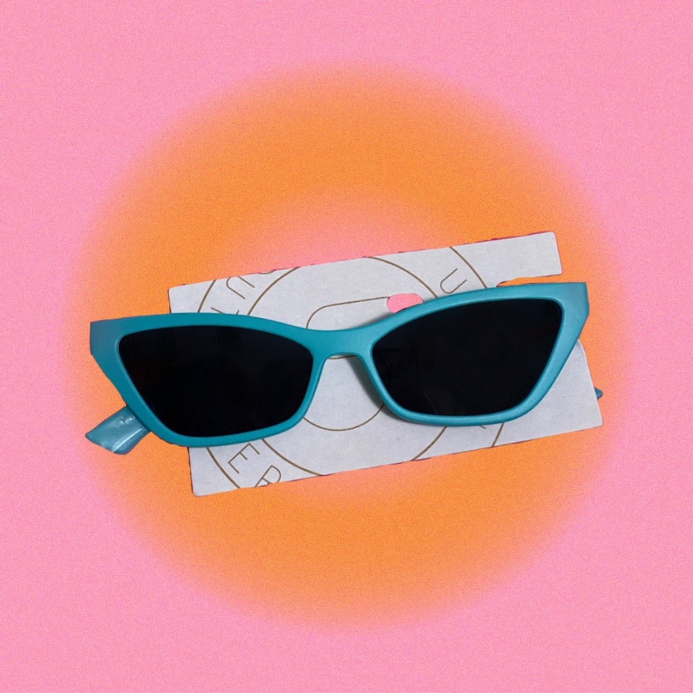 bright neon turquoise angular cat eye sunglasses